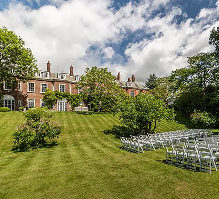 outdoor ceremony area at pelham house, affordable wedding venue in sussex 