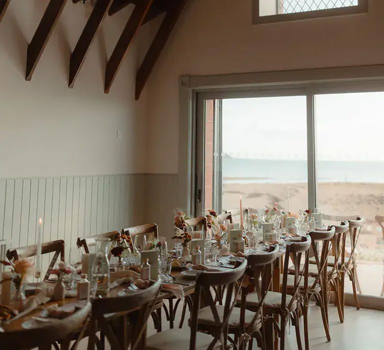 indoor reception area with tables at affordable venue, The Dougarie Boathouse in scotland