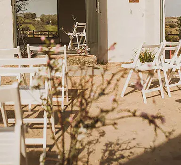 outdoor ceremony area at intimate affordable wedding venue in cornwall