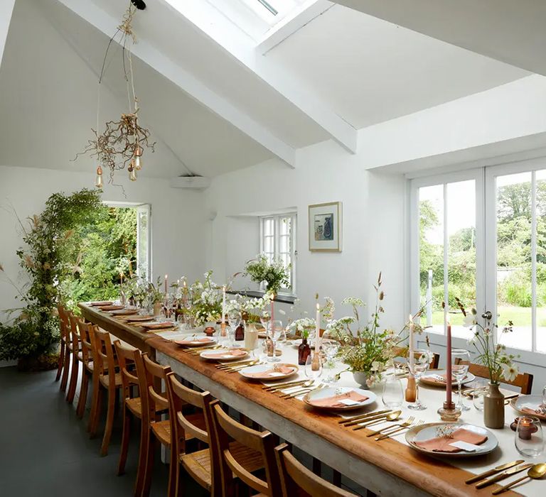 indoor intimate reception area with tables at affordable wedding venue, treseren