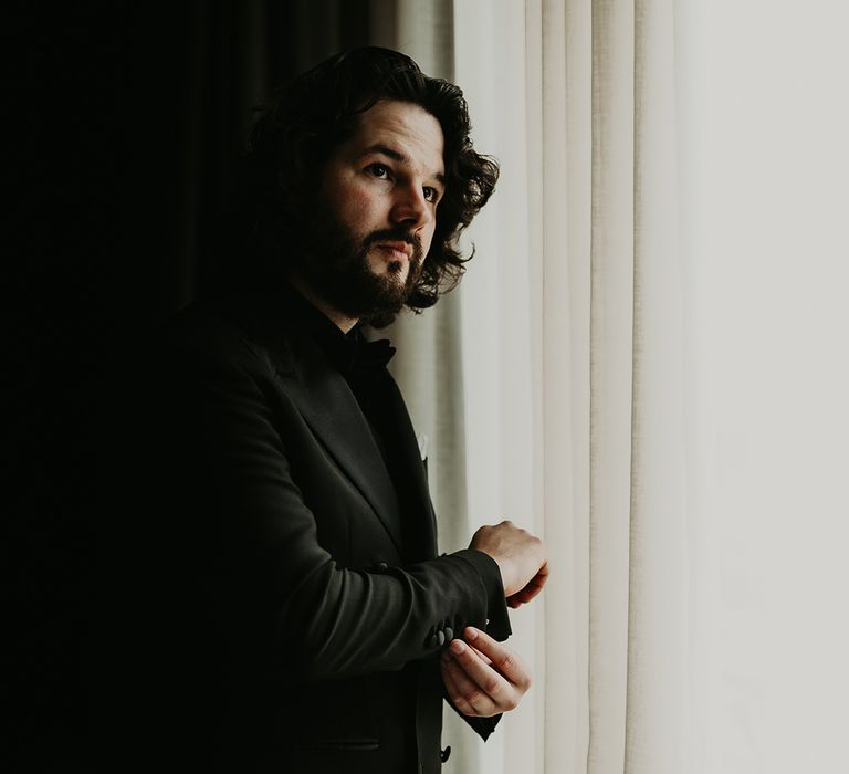 black-wedding-suit-styling-for-groom.