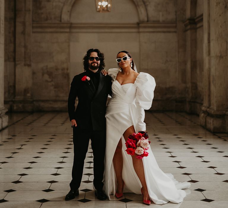 bride-and-groom-wearing-stylish-sunglasses-at-wedding
