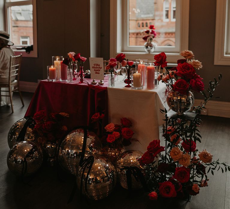 sweetheart-wedding-table-with-pink-decor-and-disco-balls