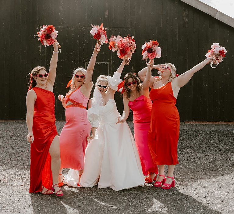 bridal-party-in-pink-and-red-bridesmaid-dresses