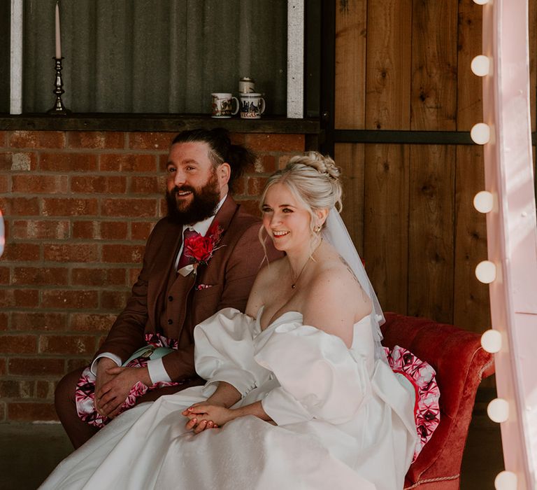 bride-and-groom-seated-for-wedding-ceremony