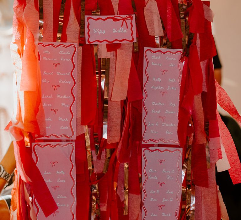 pink-and-red-wedding-streamer-wedding-seating-chart