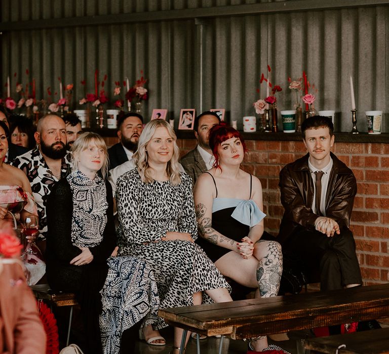 wedding-guests-watching-ceremony