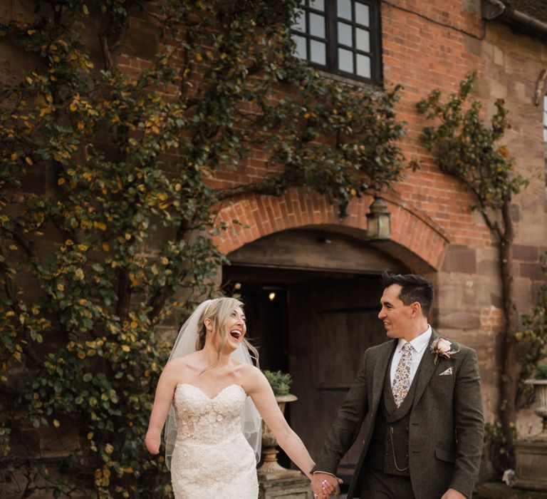 bride-with-limb-difference-with-groom-at-wedding-in-brinsop-court