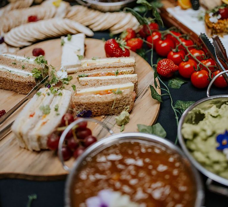 Grazing Table with Fruit, Sandwiches, Dips & More