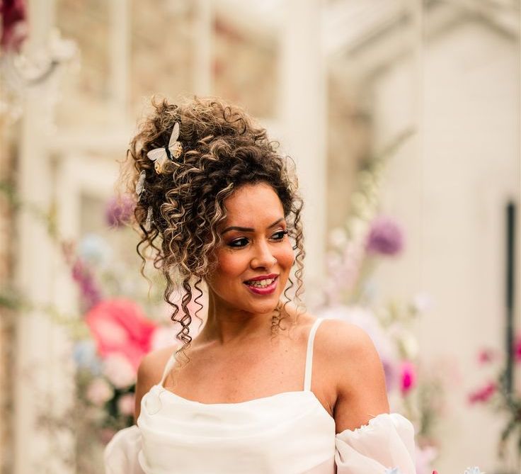 bride-in-curly-hair-in-updo-style