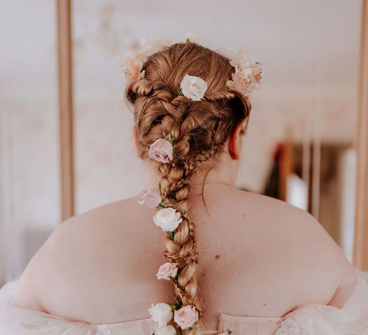 Bride Wears Her Long Hair in Intricate Braid With Pink & White Roses