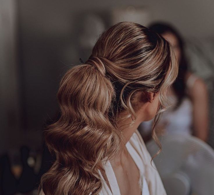 curled-wedding-hair-ponytail-hairstyle