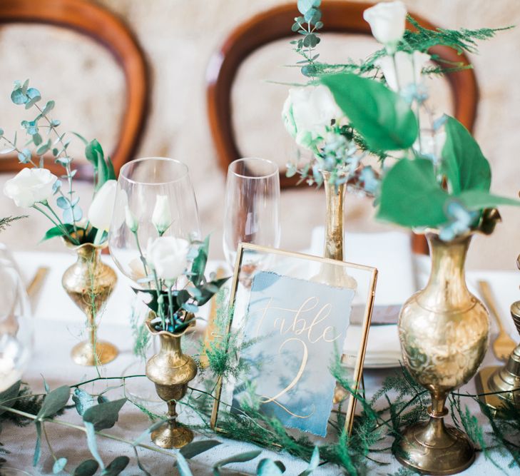 Elegant Place Setting With Gold Cutlery & Foliage Table Runner