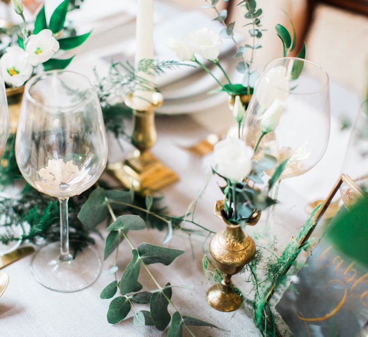 Elegant Place Setting With Gold Cutlery & Foliage Table Runner