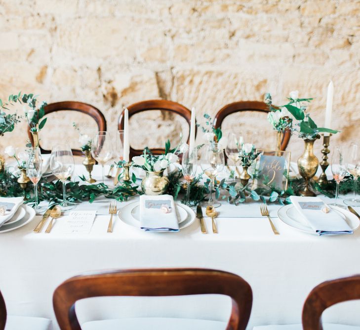 Elegant Place Setting With Gold Cutlery & Foliage Table Runner