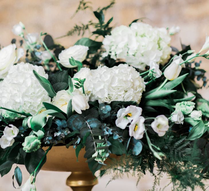 White Floral Display With Lots Of Foliage