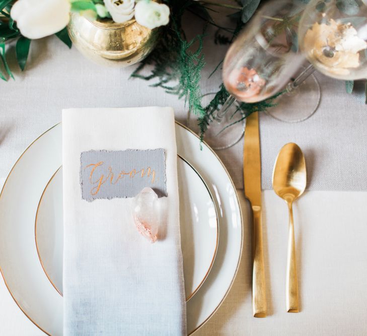 Elegant Place Setting With Gold Cutlery & Foliage Table Runner