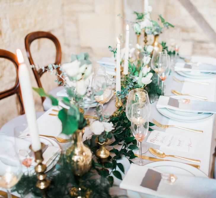 Elegant Place Setting With Gold Cutlery & Foliage Table Runner