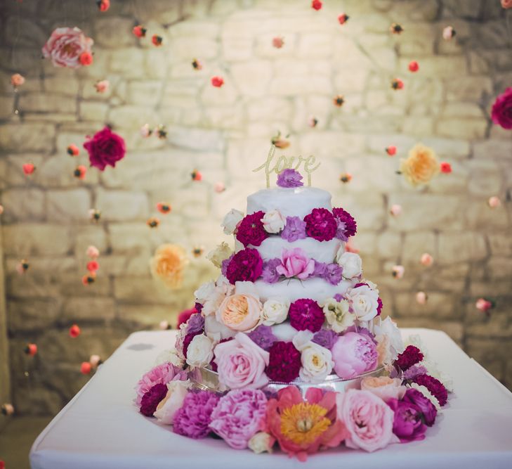 Flower Covered Wedding Cake