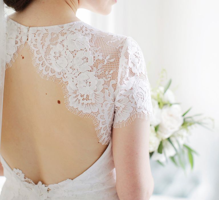 Bride in Backless Jesús Peiró Wedding Dress