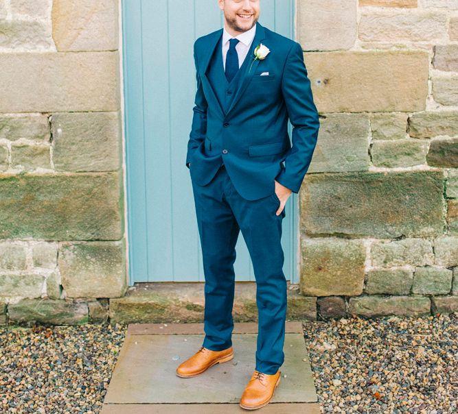 Groom in Navy Suit