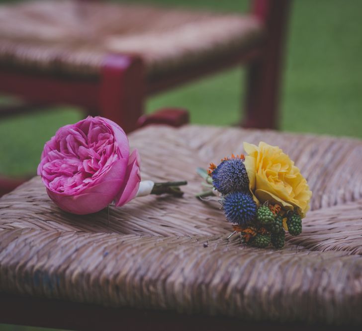 Outdoor Wedding Ceremony in Tuscany With Bright Florals And Rustic Wooden Seating