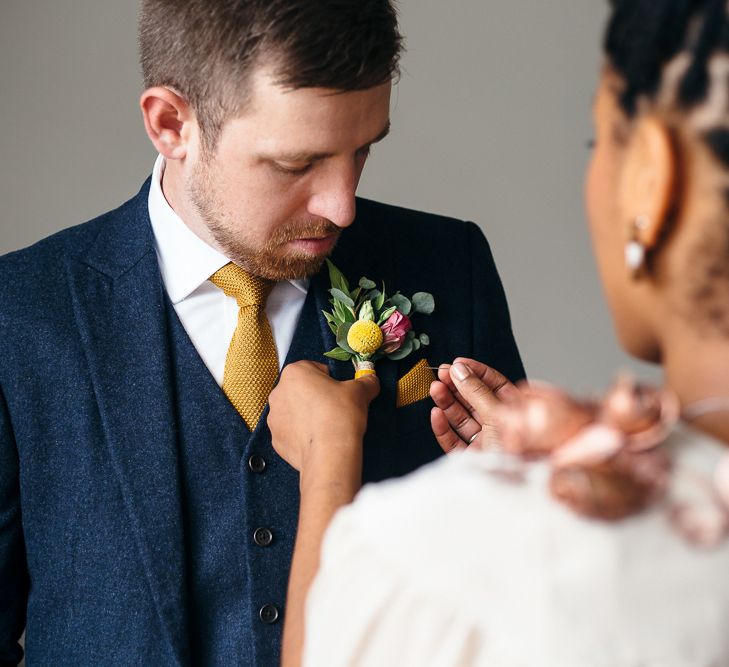 Bride in Bespoke Ailsa Monroe Jumpsuit & Cape | Groom in Next Navy Wool Suit | Relaxed Industrial Wedding at Ocean Studios, Plymouth | Freckle Photography