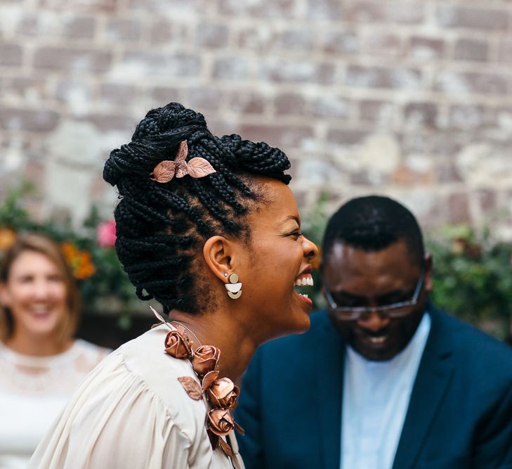 Wedding Ceremony | Bride in Bespoke Ailsa Monroe Jumpsuit & Cape | Groom in Next Navy Wool Suit | Relaxed Industrial Wedding at Ocean Studios, Plymouth | Freckle Photography