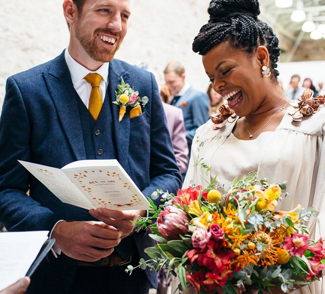 Wedding Ceremony | Bride in Bespoke Ailsa Monroe Jumpsuit & Cape | Groom in Next Navy Wool Suit | Relaxed Industrial Wedding at Ocean Studios, Plymouth | Freckle Photography