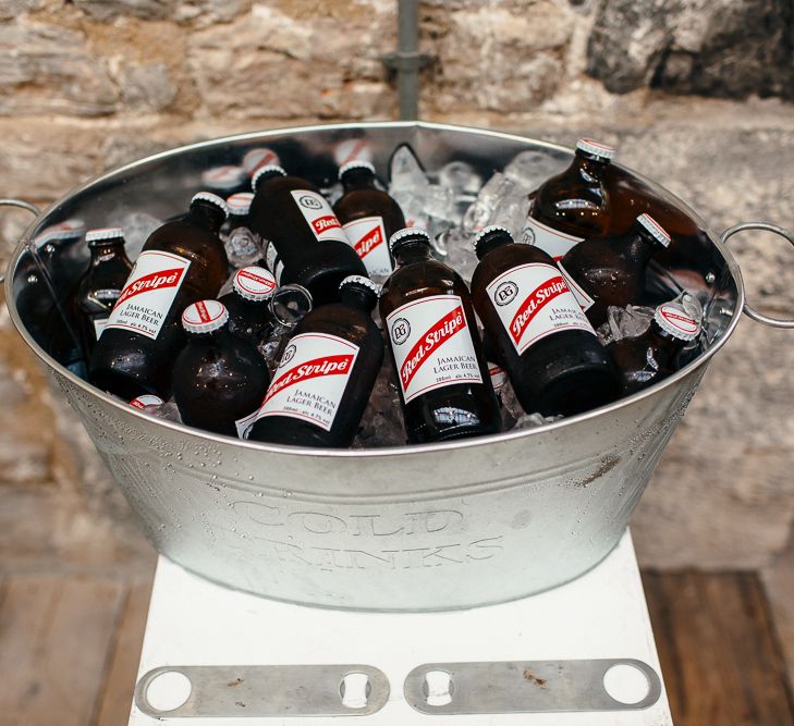 Beer Bottles in Tub | | Relaxed Industrial Wedding at Ocean Studios, Plymouth | Freckle Photography