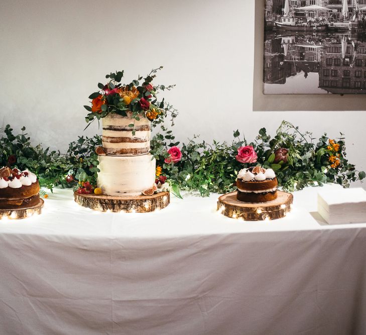 Wedding Cake Table | Floral Cake Topper | Relaxed Industrial Wedding at Ocean Studios, Plymouth | Freckle Photography