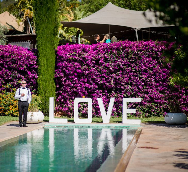 Giant LOVE Sign | Outdoor Ibiza Destination Wedding | Gypsy Westwood Photography | Infin8 Film