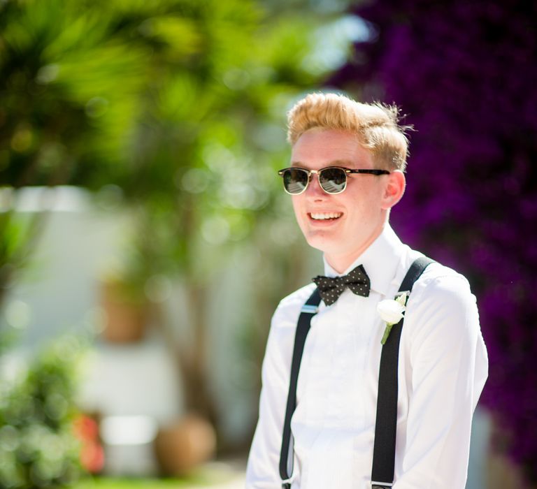 Groomsman in Braces & Bow Tie | Outdoor Ibiza Destination Wedding | Gypsy Westwood Photography | Infin8 Film