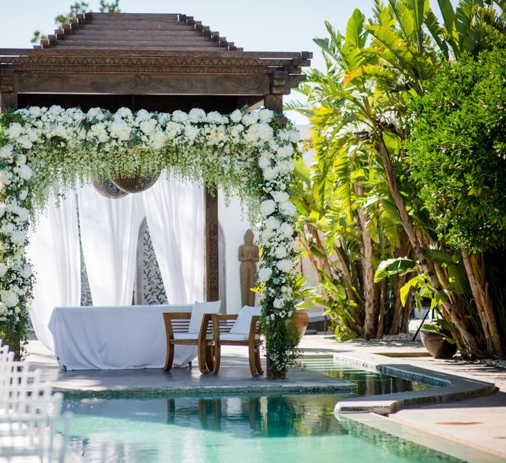 White Flower Wedding Arbour | Outdoor Ibiza Destination Wedding | Gypsy Westwood Photography | Infin8 Film