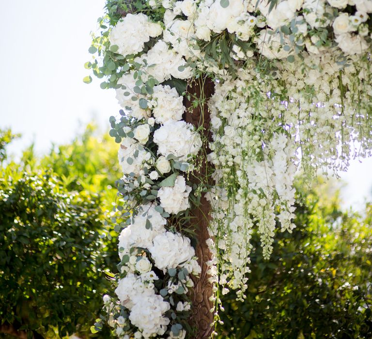 White Flower Wedding Arbour | Outdoor Ibiza Destination Wedding | Gypsy Westwood Photography | Infin8 Film