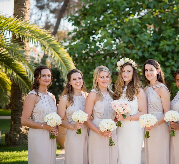 Bridesmaids in Pink Kelsey Rose Dresses | Bride in Suzanne Neville Wedding Dress | Outdoor Ibiza Destination Wedding | Gypsy Westwood Photography | Infin8 Film