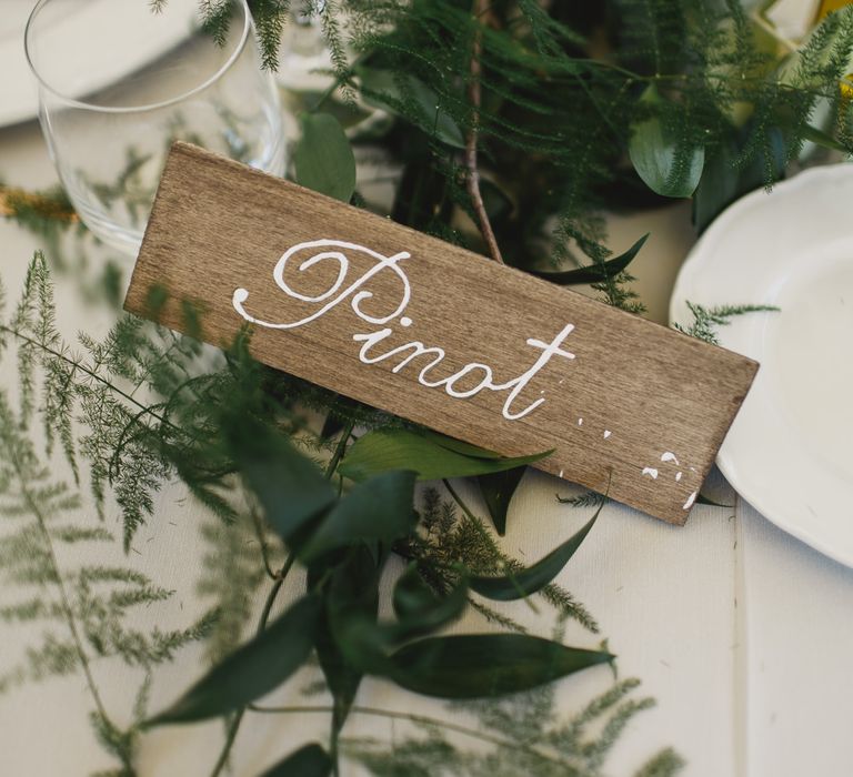 Elegant Tablescape with Gold Flatware & Greenery Table Runner