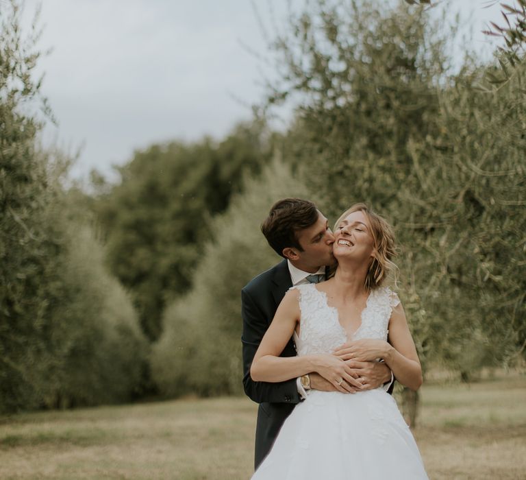 Couple Portrait with Bride in Luisa Beccaria Wedding Dress