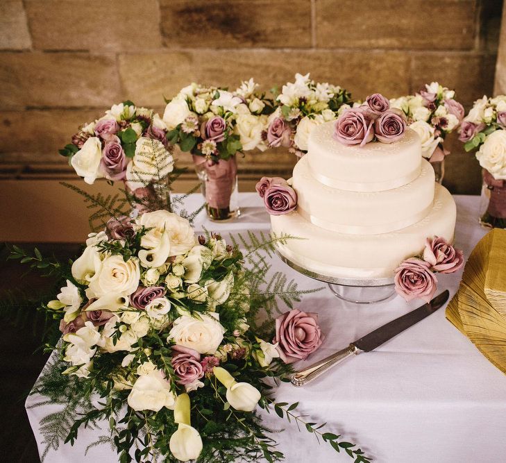 Traditional Royal Icing Wedding Cake with Lilac Flower Decor