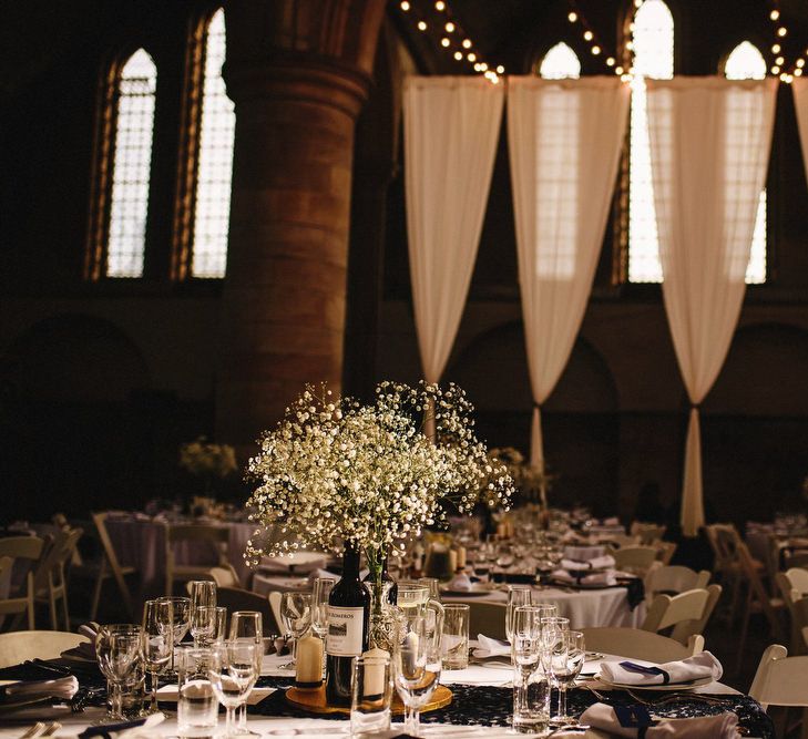 Draped Left Bank, Derelict Church Wedding Venue in Leeds | Gypsophila in Bottles Table Centrepieces | Andy Gaines Photography