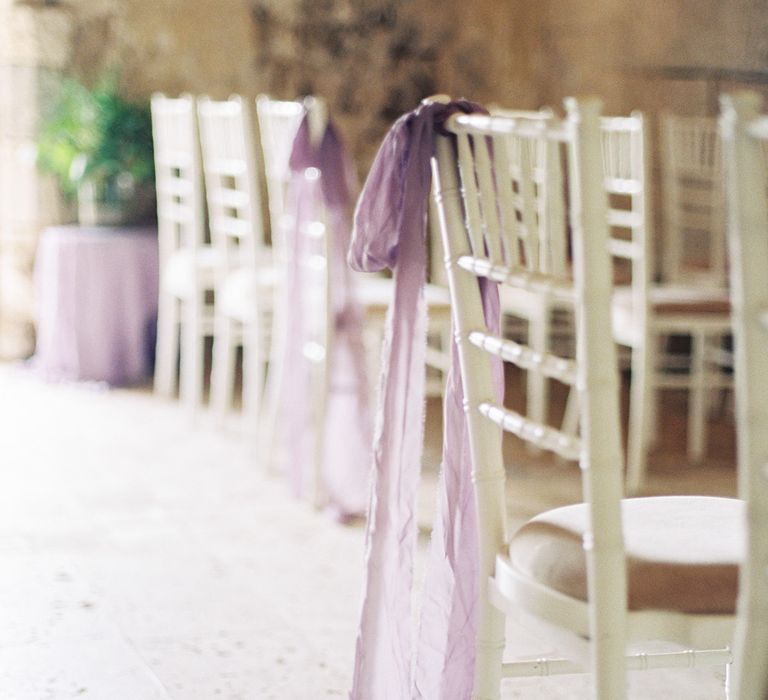 Lilac Aisle Chair Back Ribbon | Fairytale Castle Wedding at Chateau de Lisse in France | Lilli Kad Photography