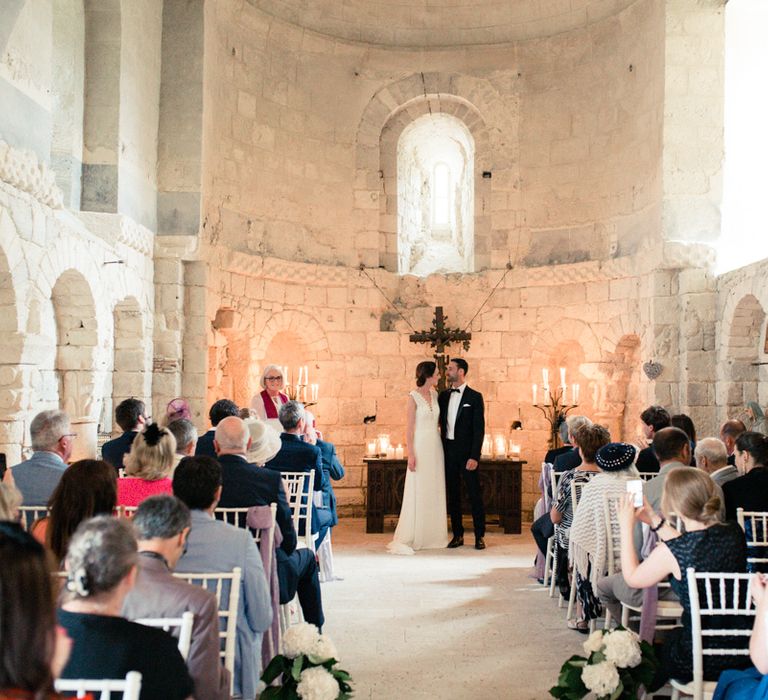 Wedding Ceremony | Bride in Pronovias Gown | Groom in Black Tie | Fairytale Castle Wedding at Chateau de Lisse in France | Lilli Kad Photography