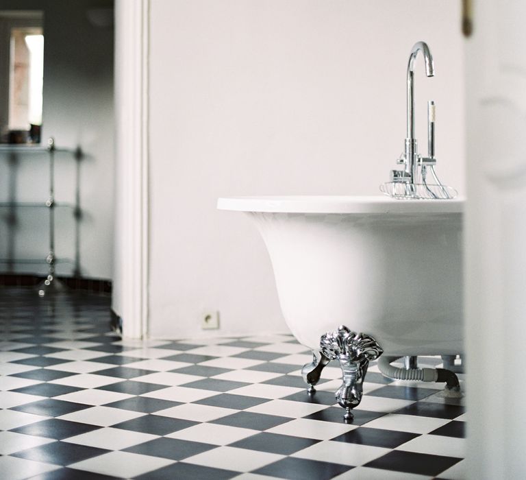 Roll Top Bath | Black & White Tiled Floor | Bathroom Interior | Fairytale Castle Wedding at Chateau de Lisse in France | Lilli Kad Photography