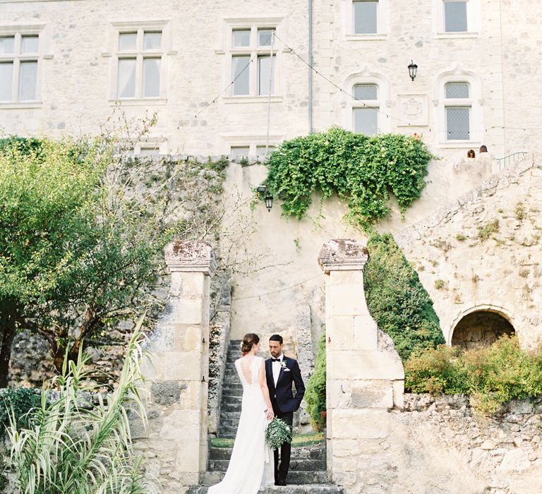 Bride in Pronovias Gown | Groom in Black Tie | Fairytale Castle Wedding at Chateau de Lisse in France | Lilli Kad Photography