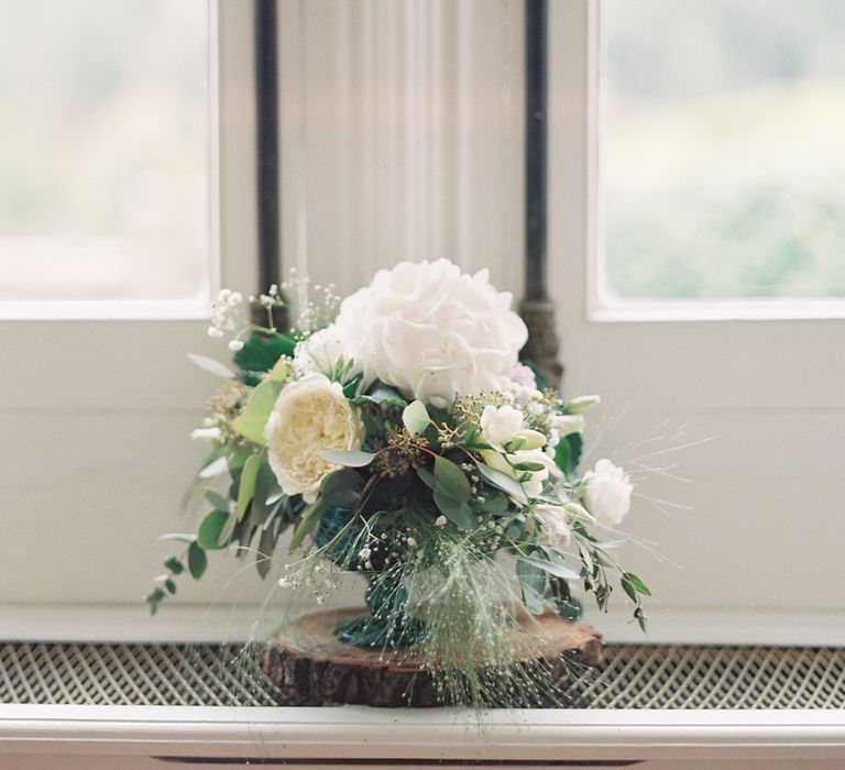 Elegant White Flower Arrangement | Fairytale Castle Wedding at Chateau de Lisse in France | Lilli Kad Photography