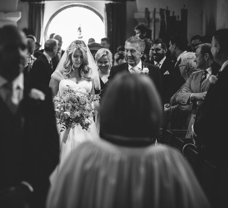 Church Bridal Entrance in Suzanne Neville Bridal Gown