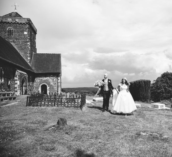 Bride in Suzanne Neville Dress & Groom in Traditional Tales