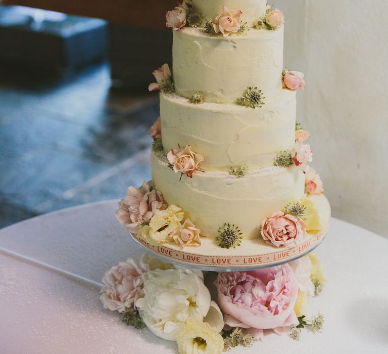 Frosted Wedding Cake Decorated with Pink & White Peonies