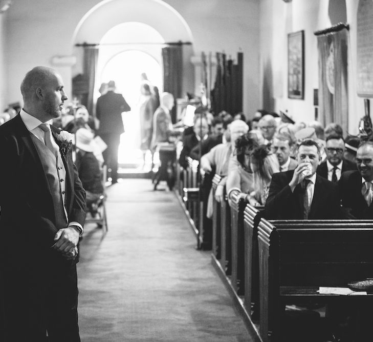 Groom at the Altar