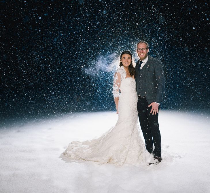 Bride & Groom Snowy Portrait